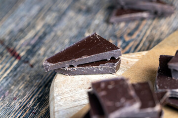 pieces of milk chocolate are lying on the table