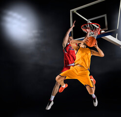 Two basketball player players in action