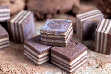 multi-layered sweets made of cream and chocolate layers