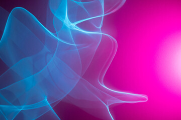 Neon abstract led lines on a magenta background. Fluorescent cyberpunk backdrop.