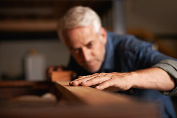 Your dream job does not exist, you must create it. Cropped shot of a senior man working with wood...