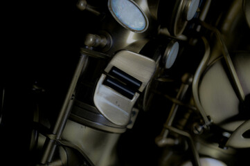 Fototapeta na wymiar vintage gold alto saxophone musical instrument background