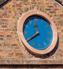 The old mill clock at Quarry Bank Mill, Styl, Cheshire, UK