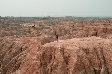 man looking at mountains 