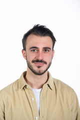 Obraz premium Classic frontal portrait of a young caucasian man with beard and mustache