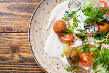 Baked potatoes with tomatoes and lettuce. Menu design concept.