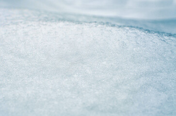 Obraz premium Abstract background with snow texture. Natural winter background for design, web.