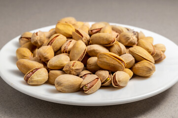 salted pistachios on a plate