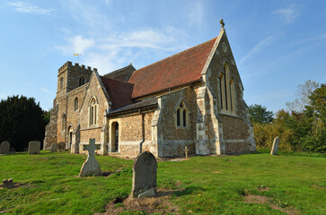 Fototapeta na wymiar St Deny's Church, Little Barford, Bedfordshire in sunshine