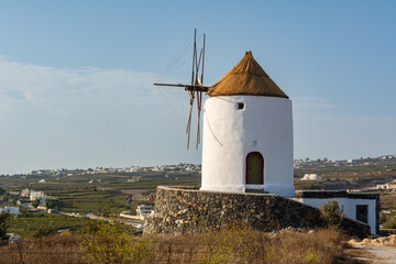 Fototapeta na wymiar Santorini old windmill in Emporio village. Cyclades Islands, Greece