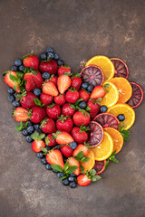 Colorful citrus fruits and berries 