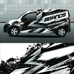 Delivery van vector design. Car design development for the company. Black background with white and gray grunge stripes for car vinyl sticker.

