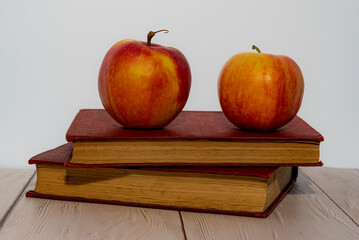 Still life with books and apples