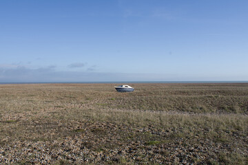boat in the middle of a field