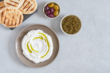 Labneh yogurt, cream  cheese with olive oil and zaatar . Traditional middle eastern arabic...