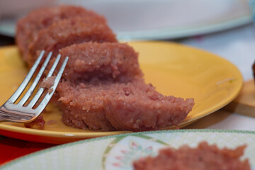 plate of cotechino and puree closeup on table