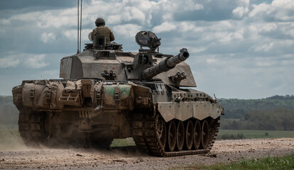 close up of a British army FV4034 Challenger 2 main battle tank in action on a military exercise,...