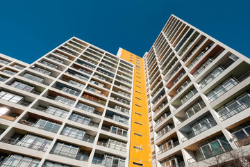 high-rise apartment building facade , real estate low angle view © hanohiki
