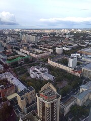 view of the city buildings and the sky from a height. High quality photo