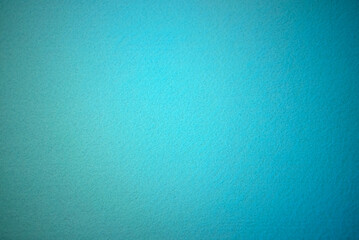 Blue texture of soft cardboard. Clear blue background. A clean place for a congratulatory text.High quality photo