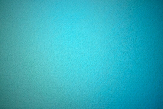 Blue texture of soft cardboard. Clear blue background. A clean place for a congratulatory text.High quality photo