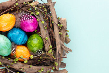 Easter eggs in the nest. Spring greeting card.
