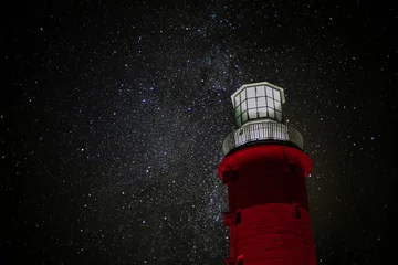 Keuken spatwand met foto lighthouse at night © mark