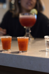 shot of chiliguaro, popular drink from Costa Rica, mixture of guaro, combined with hot chili sauce.
