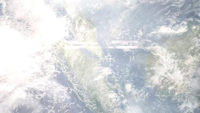 Earth zoom in from outer space to city. Zooming on Singapore, Singapore city. The animation continues by zoom out through clouds and atmosphere into space. View of the Earth at night. Images from NASA