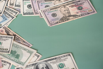 Finance, business and banking. American dollars on a green background.