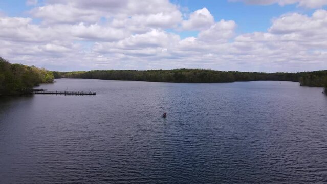 2022 - Excellent aerial view of people boating on Burke Lake, Virginia.