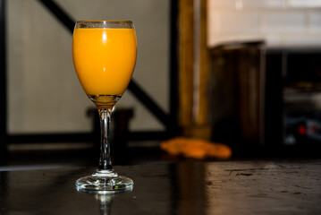 glass with freshly squeezed orange juice