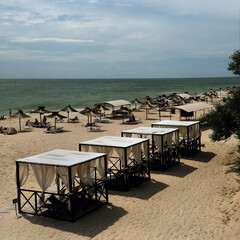 island in the ocean, against a background of beautiful clouds at sunset.