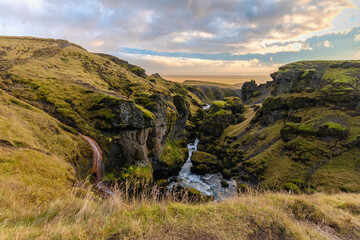 Fototapeta na wymiar the Fimmvorduhals Trailhead to the canyon at Skogafoss waterfall on Iceland