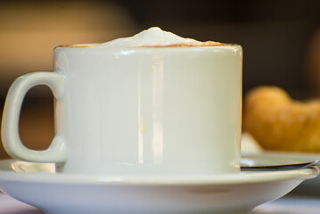 coffee with sparkling milk on a plate