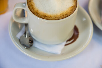 coffee with sparkling milk on a plate