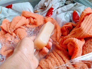 hand holding bar of soap