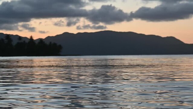4K video of yaht in ocean in sunset time
