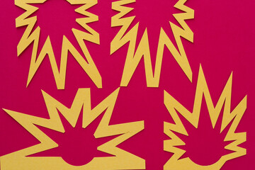 irregular abstract shapes on red paper