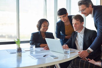 We always find a way to succeed. Shot of corporate businesspeople meeting in the boardroom.