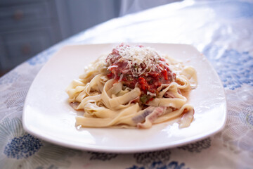 homemade pasta on a plate in a restaurant