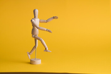 wooden mannequin with ribbon