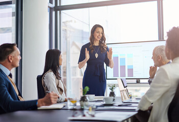 Shes taking the lead in this presentation. Cropped shot of a businesswoman giving a presentation in a boardroom.