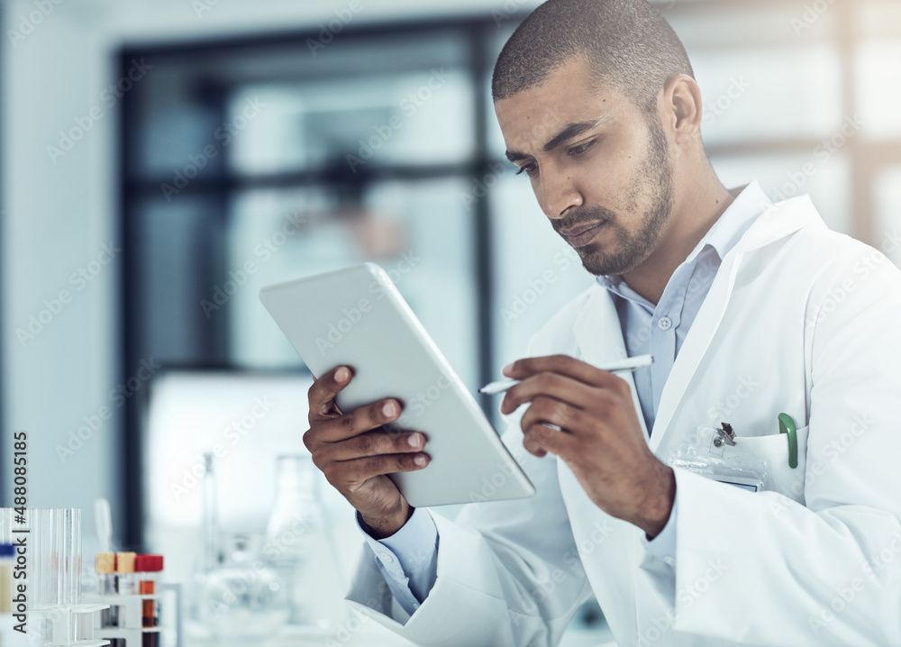 Aufkleber Entering data into the information system. Shot of a scientist recording his findings on a digital tablet.