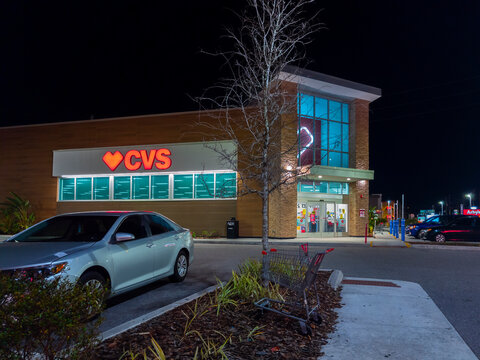 Kissimmee, Florida - February 4, 2022: Night View of CVS Pharmacy Building Exterior. CVS Health Acquired Target Corporation's Pharmacy and Retail Clinic Businesses.