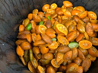 Lots of orange peels in the trash.
