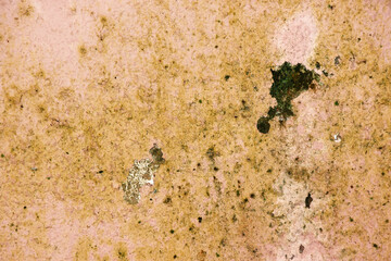 Stains on the surface of old walls or concrete for the background, old paint peeling off old walls.