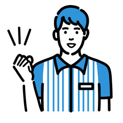 笑顔でガッツポーズをしているコンビニ店員の若い男性
