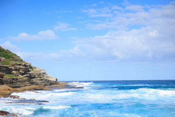 Fototapeta na wymiar タマラマビーチと青い海と青い空