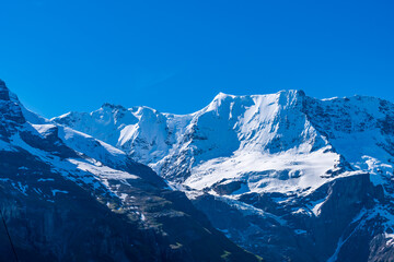 Fototapeta premium The Swiss Alps at Murren, Switzerland. Jungfrau Region. Snow peaks.